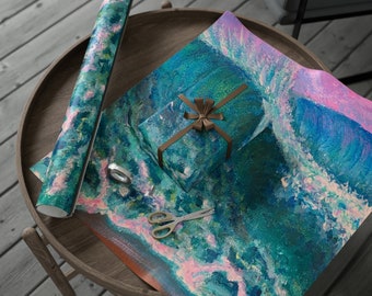 May include: A teal and pink abstract wave design wrapping paper with a teal gift box wrapped with brown ribbon and a bow. The wrapping paper is on a wooden table with a roll of wrapping paper and scissors.