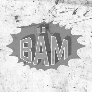 May include: A gray and white comic book style explosion with the word "BAM" in the center.