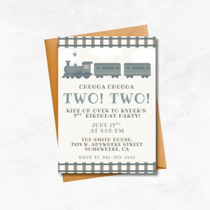 May include: A birthday party invitation with a train theme. The invitation features a gray train graphic, the text "CHUGGA CHUGGA TWO! TWO!" and details for a second birthday party, including the date, time, and location.