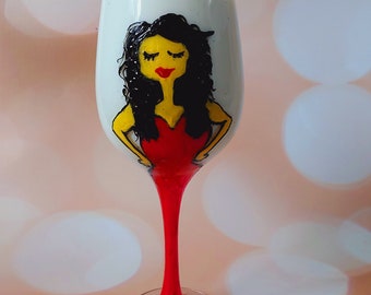 Wine glass with a figure painted with paints