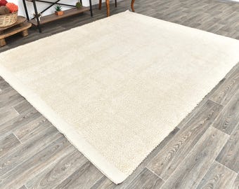 Alfombra orgánica de 8x9 pulgadas, tejida a mano en lana gruesa, color marfil/blanquecino, tejido trenzado, estilo escandinavo, de lana de Nueva Zelanda.