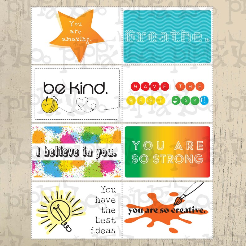 Op de afbeelding: Een verzameling van acht rechthoekige kaarten met inspirerende berichten. De kaarten bevatten zinnen als "You are amazing", "Breathe" en "Be Kind". Kleurrijke ontwerpen omvatten een ster, een bij en verfspatten. Het thema is motiverend.
