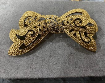Vintage Gold Tone and Marcasite Bow Brooch made by 1928