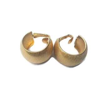 Clip Avon vintage su cerchi color oro