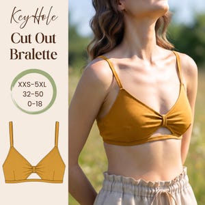 Könnte beinhalten: Ein senfgelbes Bralette mit einem Schlüsselloch-Ausschnitt in der Mitte und dünnen Trägern. Das Bild enthält den Text Key Hole Cut Out Bralette sowie die Größenangaben XXS-5XL, 32-50 und 0-18 neben einer flachen Illustration des Produkts.