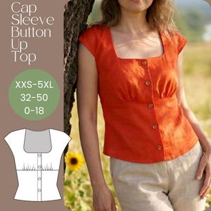 Peut inclure: Un haut orange à manches courtes et boutons, avec un col carré et des boutons en bois. Le haut a une taille ajustée et est fait d'un tissu texturé. L'image comprend également un schéma et le texte : "Cap Sleeve Button Up Top", "XXS-5XL", "32-50", et "0-18".