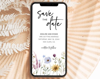Op de afbeelding: Een digitale save the date-aankondiging met een bloemenontwerp. De tekst luidt "Save the Date" met de namen "Adaline en Ryder" en de trouwdatum "Zaterdag 18 mei 20XX". De locatie is "Oak Glen, CA".