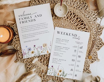 May include: A wedding invitation suite featuring a floral design. The invitation card reads "Welcome Family and Friends" and includes the names "Adaline & Elliot". The second card details the weekend events, including a welcome dinner, wedding ceremony, reception, and brunch.