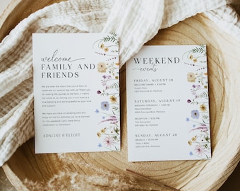 May include: A white card with a floral border and the text "welcome family and friends" and "adaline & elliot". The card also includes a list of events for a wedding weekend, including a welcome dinner, wedding ceremony, reception, and brunch.