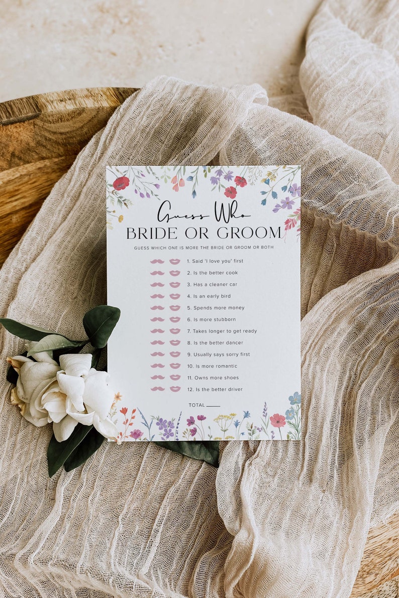 May include: A printable bridal shower game card with a floral border. The card has the title "Guess Who Bride or Groom" and a list of 12 questions to determine who is more like the bride or groom.