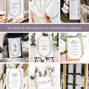 May include: A set of printable baby shower decorations featuring a floral wreath design with watercolor flowers. The set includes a welcome sign, table numbers, a bar menu, a seating chart, and place cards. The text on the welcome sign reads "Baby in Bloom, Welcome to Kristen's Baby Shower".