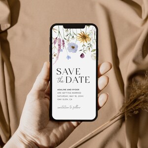 May include: A mobile phone screen displaying a save the date card with a floral design. The text reads "Save the Date", "Adaline and Ryder are getting married", "Saturday, May 18, 20XX", "Oak Glen, CA", and "Invitation to follow".
