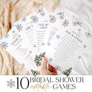 Può includere: Un insieme di biglietti bianchi per giochi per addio al nubilato con disegni di fiocchi di neve e alberi dorati e argentati. Il testo sui biglietti include "What's in Your Purse?", "Would She Rather" e "The BF or Groom". L'immagine include anche il testo "10 Bridal Shower Editable Games".