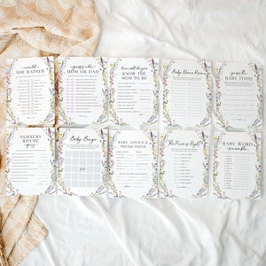May include: A set of ten printable baby shower games with floral borders. The games include "Would She Rather", "Guess Who Mom or Dad", "How Well Do You Know the Mom to Be", "Baby Name Race", "Guess the Baby Food", "Nursery Rhyme Quiz", "Baby Bingo", "Baby Advice Predictions", "The Price is Right", and "Baby Word Scramble".