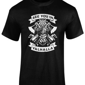 May include: Black t-shirt featuring a white graphic of a Viking warrior with axes and the text "See you in Valhalla."