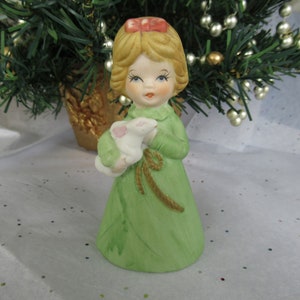 JASCO porcelain bell, girl in green with rabbit, 1978