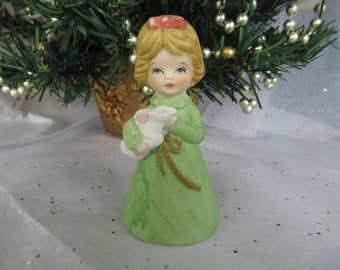 JASCO porcelain bell, girl in green with rabbit, 1978