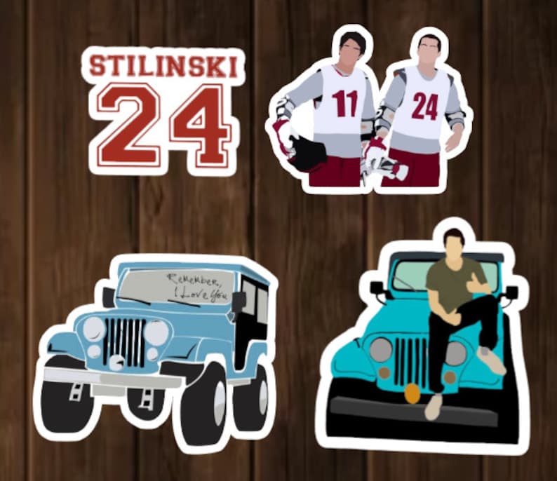 May include: Four stickers featuring characters and a jeep from the TV show Teen Wolf. The first sticker is a red and white jersey with the number 24 and the name "Stilinski" on it. The second sticker shows two men wearing jerseys with the numbers 11 and 24. The third sticker is a blue jeep with the words "Remember, I love you" written on the windshield. The fourth sticker shows a man sitting on the hood of a blue jeep.