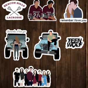 May include: A set of nine stickers featuring characters and logos from the TV show Teen Wolf. The stickers include a lacrosse team logo, a jeep, a couple, a group of people, and the words "Teen Wolf" and "Remember I love you".