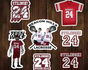 May include: A set of 7 stickers featuring the text "Teen Wolf" and "Beacon Hills" with lacrosse players, a wolf paw print, and the name "Stilinski" with the number 24.