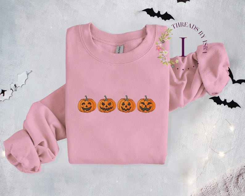 Felpa con zucca di Jack O' Lantern ricamata: Pullover della stagione spettrale Rosa