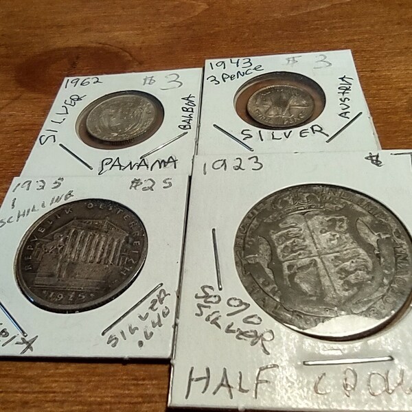 Four SILVER Foreign coins. 1925 Austria, 1943 France, 1962 Panama, 1923 India?