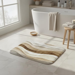 May include: A rectangular bath mat with a wavy pattern in shades of brown, beige, and white. The mat is placed on a tiled floor in a bathroom setting, near a bathtub and a window.