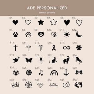 May include: A chart with 36 black and white symbols, labeled S1 through S36. The symbols include hearts, stars, paw prints, crosses, infinity signs, flowers, doves, butterflies, bees, cats, elephants, horses, soccer balls, basketballs, musical notes, rainbows, anchors, bows, crowns, compasses, diamonds, heartbeats, wedding rings, and footprints.