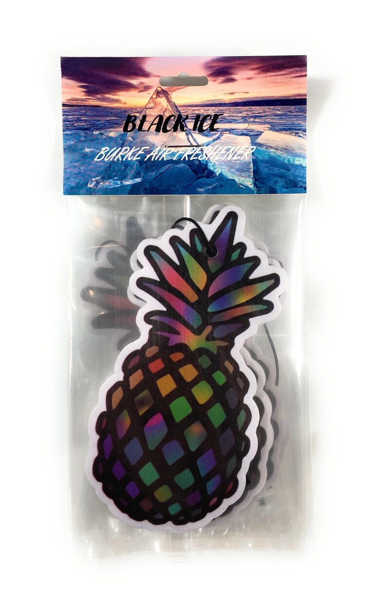 May include: Air fresheners in a clear plastic package. The air fresheners are pineapple-shaped with a rainbow design. The package has the words "BLACK ICE" and "BURKE AIR FRESHENER" printed on it, with a background image of an icy landscape.