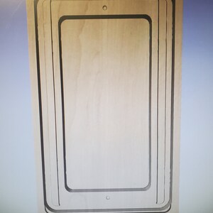 May include: A wooden tablet stand with a rectangular cutout for a tablet. The stand has a natural wood finish and a simple design.