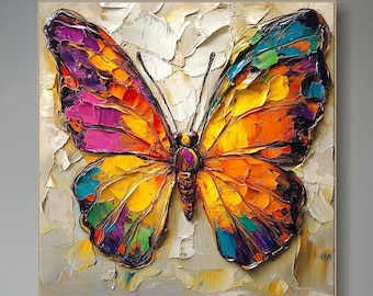 May include: A colorful abstract painting of a butterfly with yellow, orange, pink, purple, green, and blue wings. The butterfly is painted on a white background with a textured brushstroke effect.