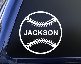 May include: A white vinyl decal featuring a circular baseball graphic with traditional stitching patterns and the name JACKSON printed in bold, uppercase sans-serif letters across the center, designed for application on a smooth surface.