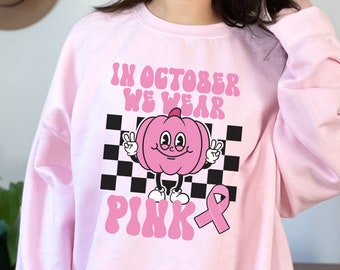 In October We Wear Pink Sweatshirt, Breast Cancer Awareness Month Shirt, Pink Ribbon Crewneck, Retro Halloween Cancer Sweater, Survivor