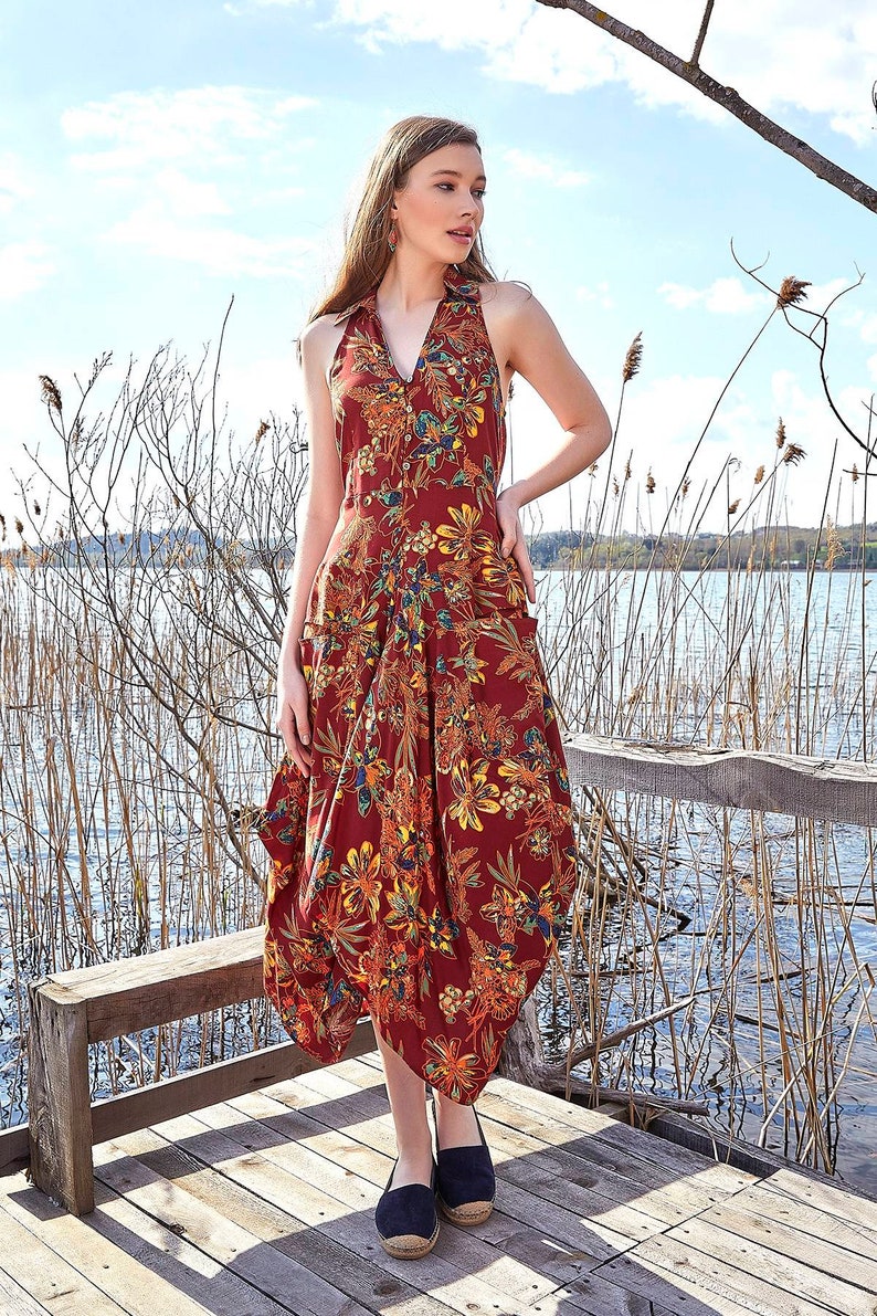 Floral pattern summer dress with halter back style. It V-Neck with coconut buttons, and it looks so stylish. Bohemian style floral pattern dress