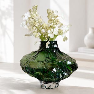 Large dark green glass vase