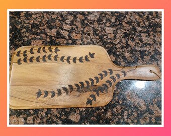 Handcrafted charcuterie cutting board ivy decoration
