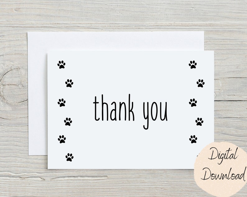 May include: Printable thank you card with a paw print border. The card says "thank you" in black text.