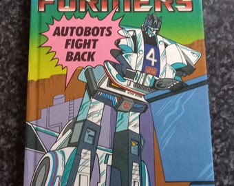 Ladybird. The Transformers Autobots Fight Back.  ( LB64  )