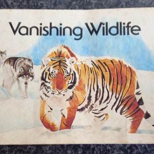 Brooke Bond Collectorkaarten Vanishing Wildlife compleet in album. heel goede staat.