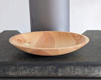 Wooden bowl turned from pine