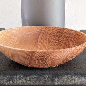 Wooden bowl turned from ash