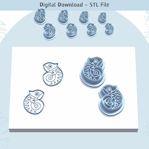 May include: A digital download of an STL file for 3D printing. The file contains a design for a chameleon cookie cutter. The image shows a white background with two blue chameleon cookie cutters and a row of nine smaller blue chameleon cookie cutters.