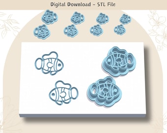 May include: A digital download of STL files for 3D printing. The files contain designs for five different clownfish cookie cutters. The cookie cutters are blue and white and are arranged on a white background.