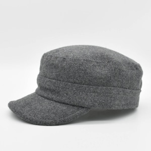 May include: A gray wool military style cap with a flat brim.