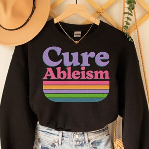 Sweat-shirt Cure Ableism : imprimé effet vieilli, droits des personnes handicapées