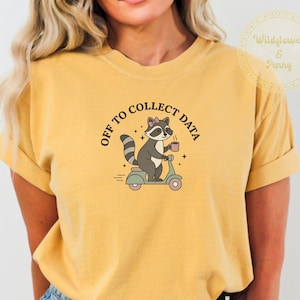 May include: A trio of ceramic mugs with a speckled, matte finish in light blue, cream, and grey. The mugs have a simple, modern design and a comfortable handle. Ideal for tea or coffee.