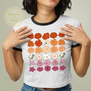 May include: A set of three ceramic mugs with a speckled, matte finish. The mugs are in shades of cream, light gray, and dark gray. Each mug has a simple, minimalist design, perfect for coffee or tea.