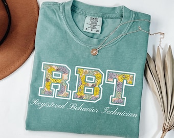 Comfort Colors RBT Shirt: Floral Registered Behavior Technician Tee