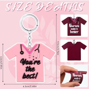 May include: Pink and white nurse's uniform keychain with a stethoscope and the text "You're the best!"  The keychain is 6.3 cm wide and 4.6 cm tall.