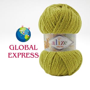 Puede incluir: Ovillo de lana Alize Baby Softy Plus verde claro. La lana está envuelta con una etiqueta que dice "Baby Alize Softy Plus". La imagen también incluye el texto "GLOBAL EXPRESS" y un gráfico de un globo.